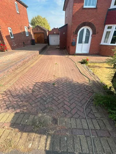Driveway Cleaning and Weed Removal Transformation