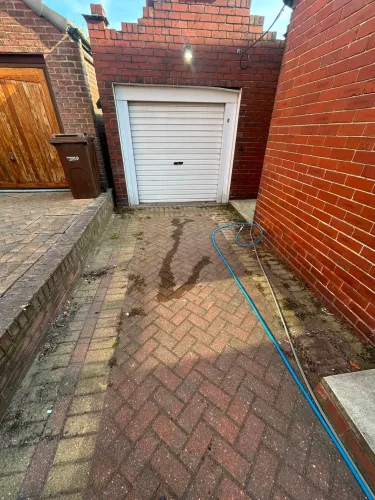 Driveway Cleaning and Weed Removal Transformation (image 2 of 4)